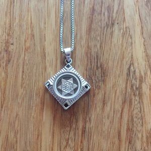 DONATE 4/20 Spinning Silver Star of David Necklace